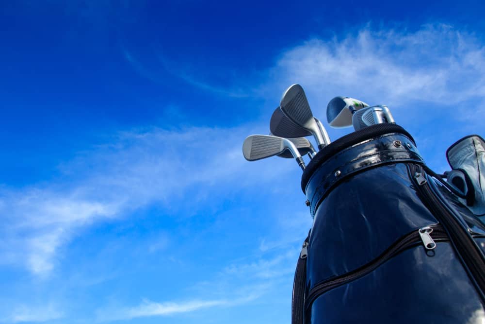 Golf club in bag with blue sky background