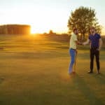 Two friends handshaking