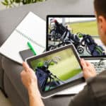 Young man online with laptop