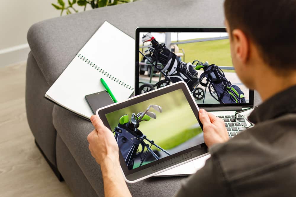 Young man online with laptop