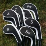 golf club covered with labeled head cover