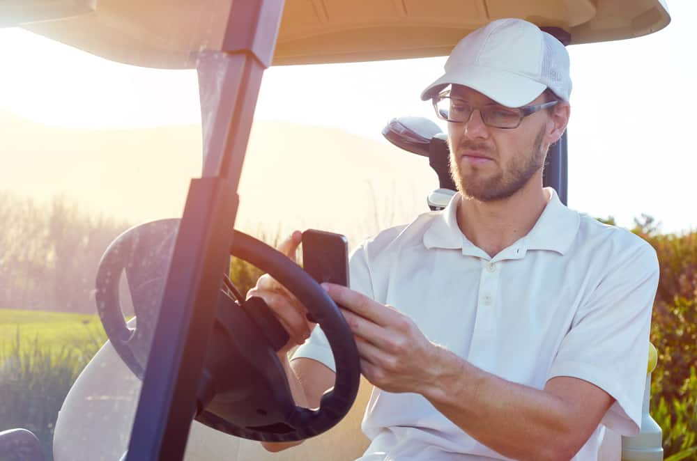 golf man relaxing on buggy cart