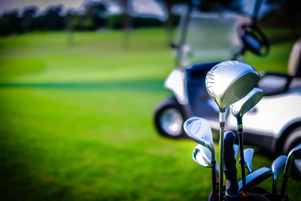 Golf club and golf cart in golf course