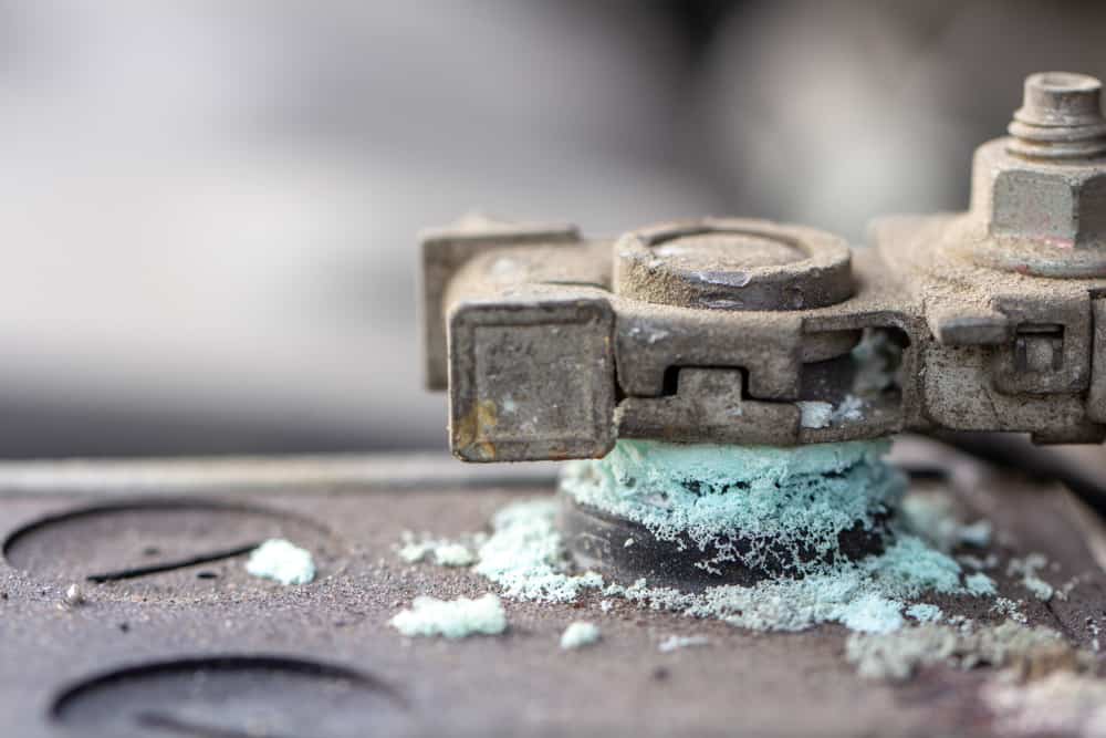 Old battery corrosion deteriorate leaking with blue acid powder