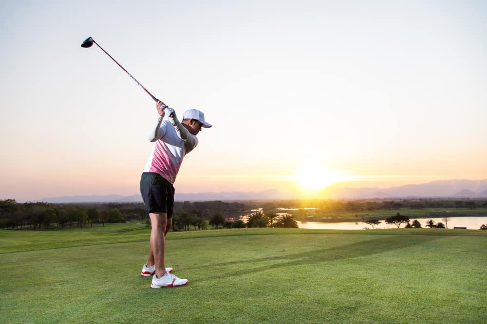 Professinal golf player on golf course