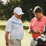 Senior man taking break from golfing