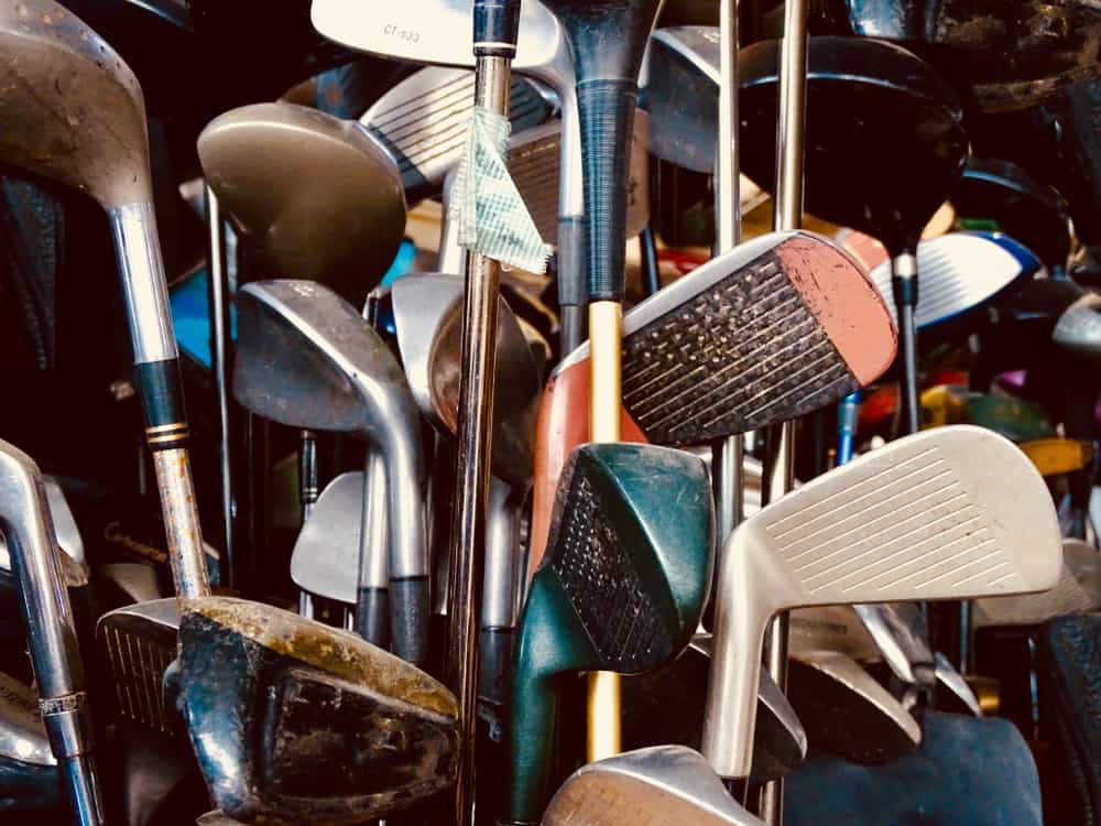 Used golf clubs on the shelf