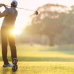 golfing in sunlight of the morning