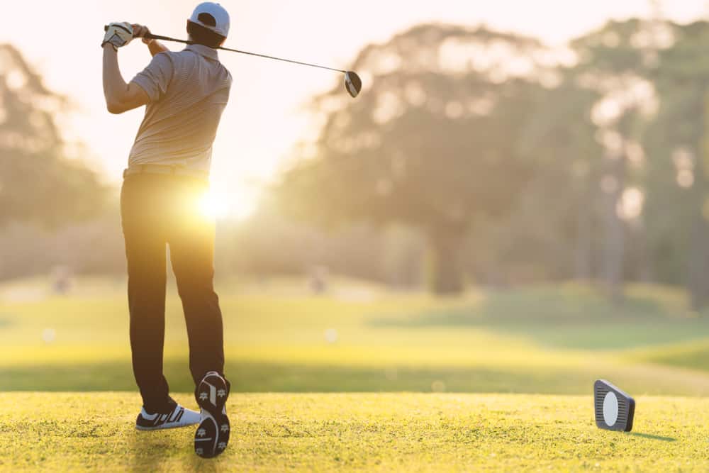 golfing in sunlight of the morning