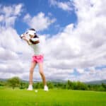 woman golf player in action