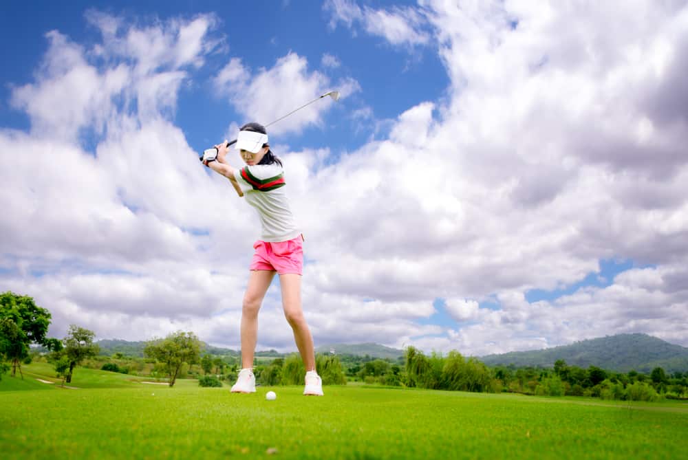 woman golf player in action