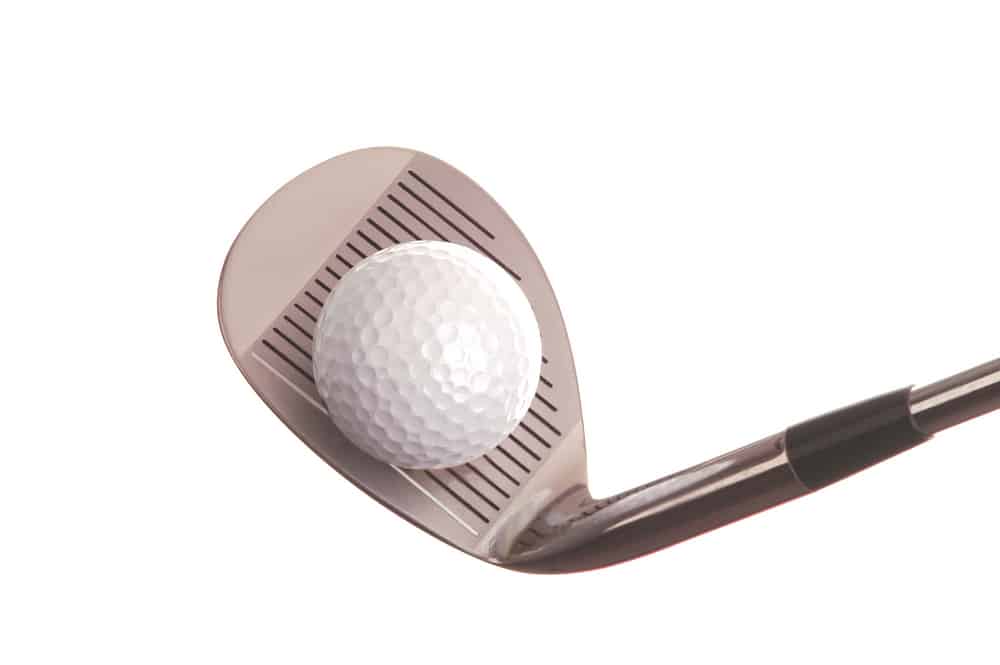 Golf Ball on pitching wedge