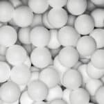 Golf balls multitude close up
