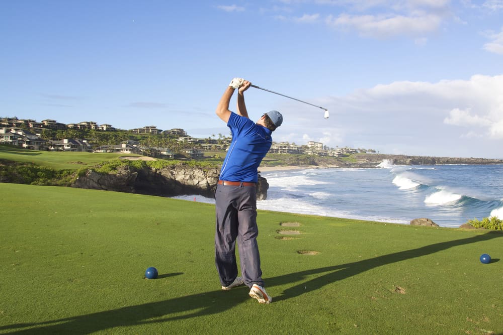 Golfer Teeing Off on Maui