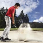 Golfer in sand trap