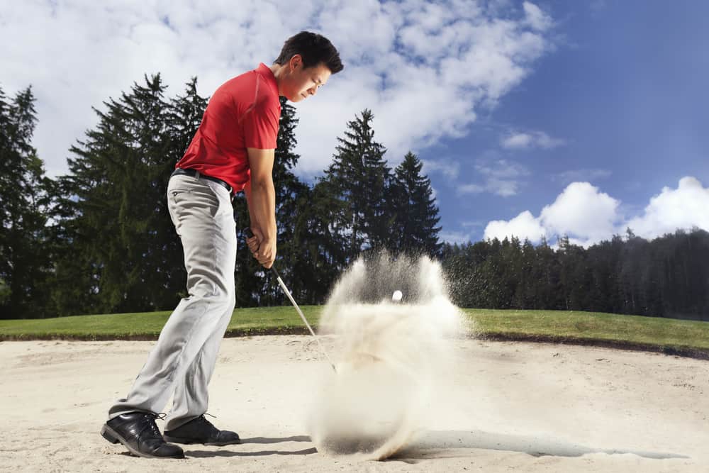 Golfer in sand trap