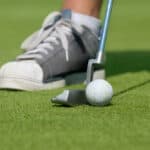 Golfer with driving-putter
