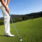 Man playing golf