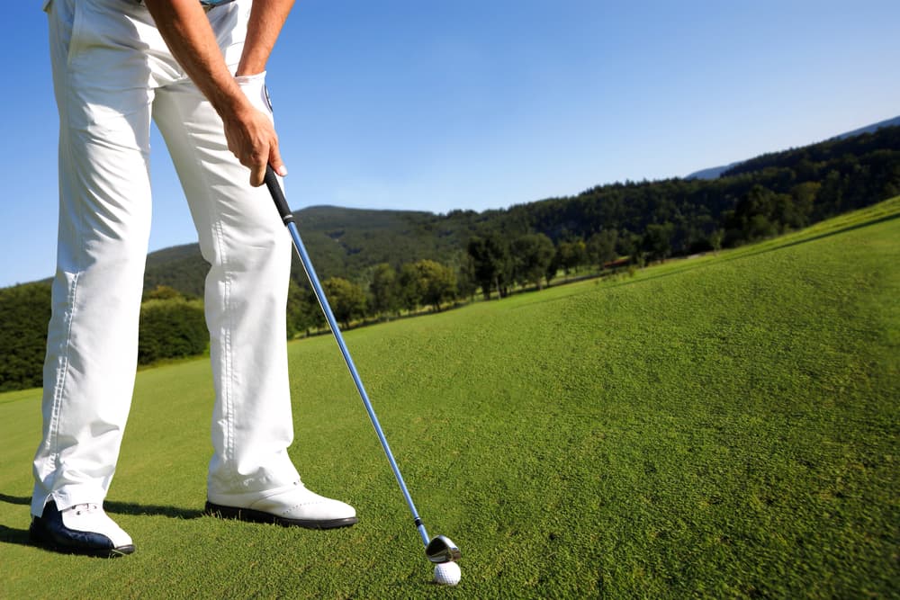 Man playing golf