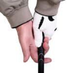 Man preparing to grip a golf club
