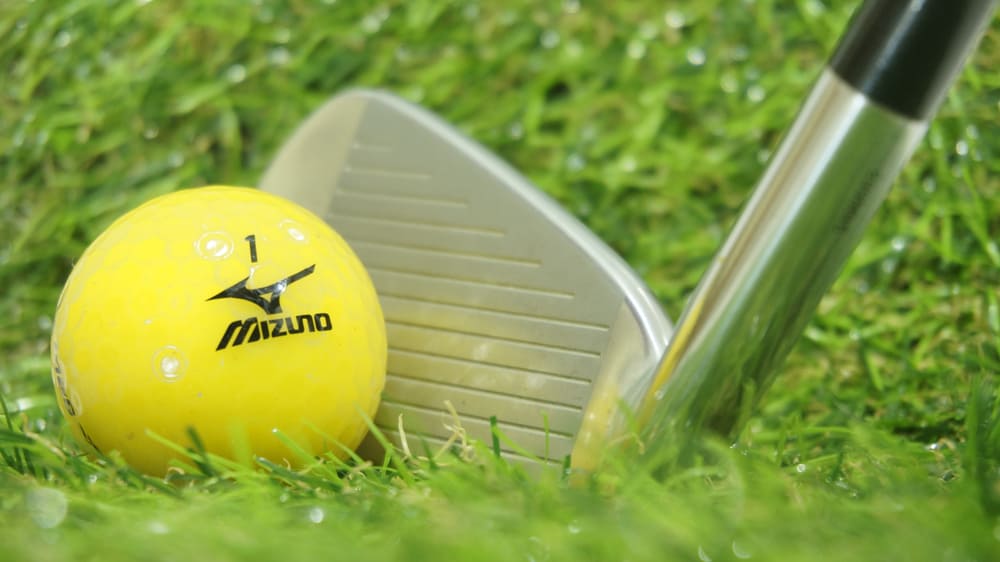 Mizuno golf ball on green grass