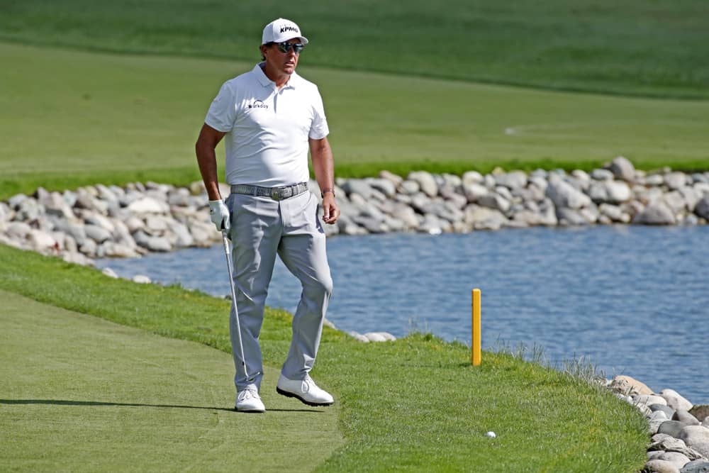 PGA golfer Phil Mickelson plays the 14th hole during the second round of the Rocket Mortgage Classic on July 02, 2021, at the Detroit Golf Club in Detroit, Michigan.