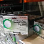 view of several cases of Kirkland Signature Three-Piece Urethane Cover Golf Balls