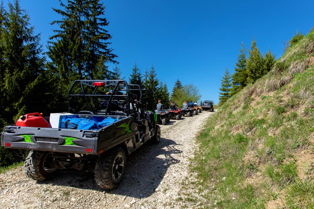 tour group travels on ATVs and UTVs