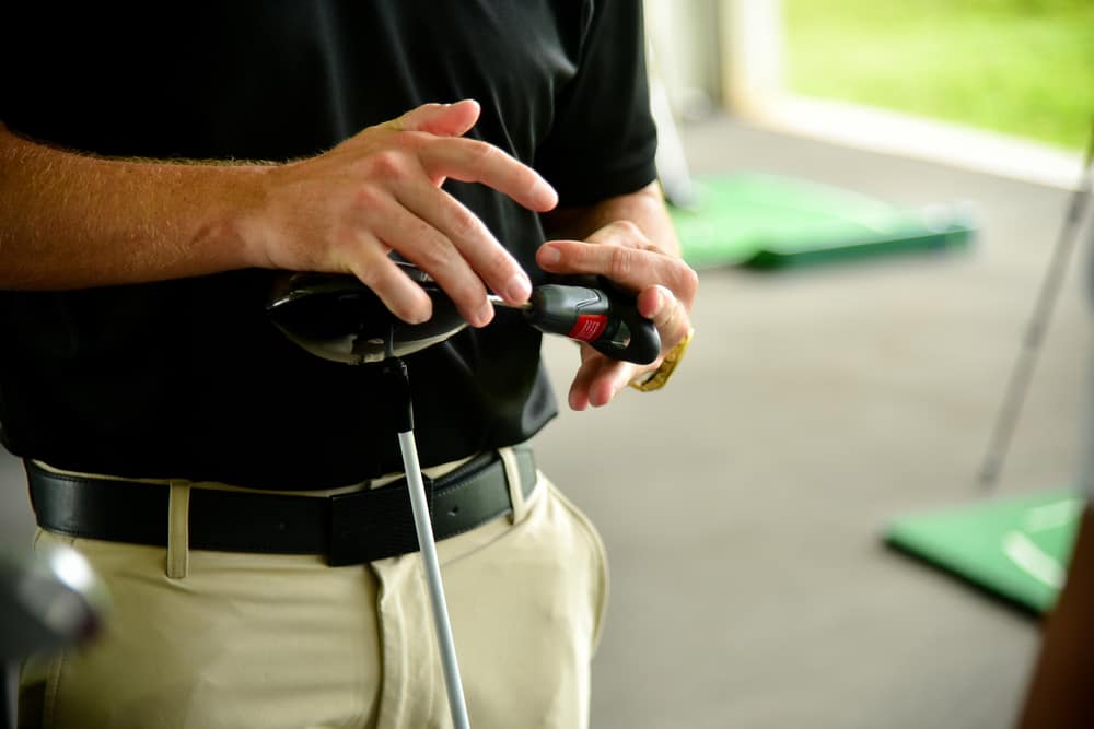 Golf club fitting working on the fitting process