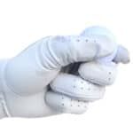 Golfer wearing Golf Glove Holding a Golf Ball
