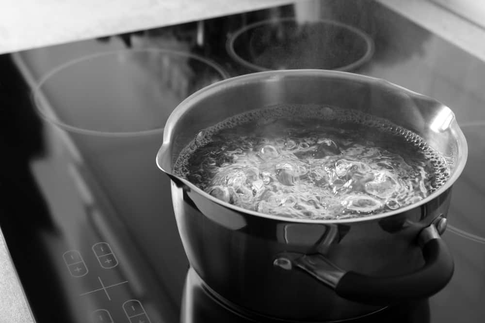 Pot with boiling water