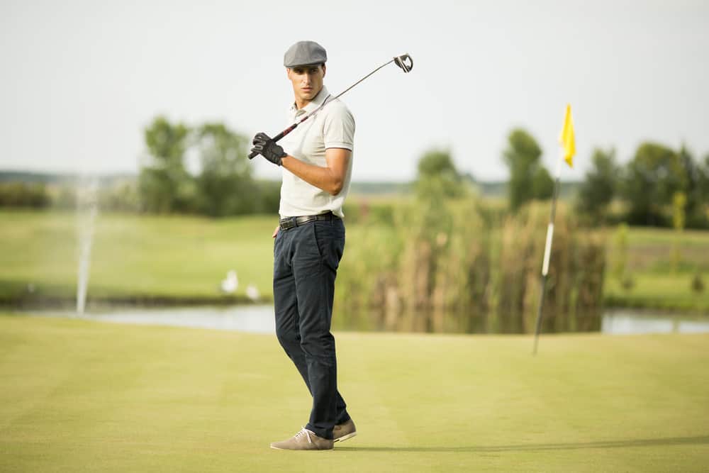 Young man playing golf