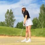 golf shot from sand bunker golfer hitting ball from hazard