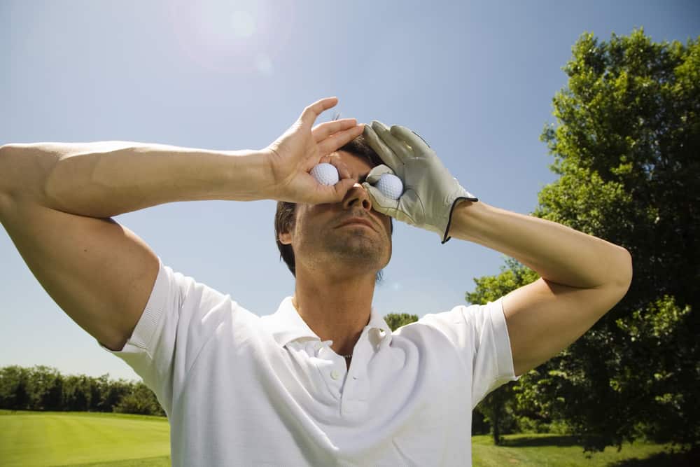 golfer searching for the ball