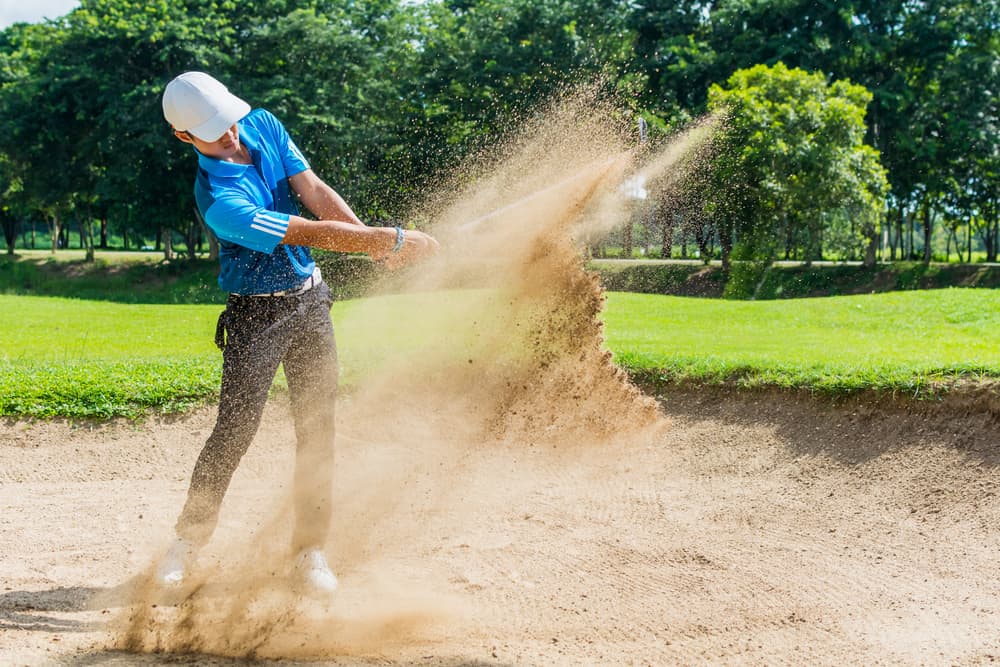 swing in sand pit during practice