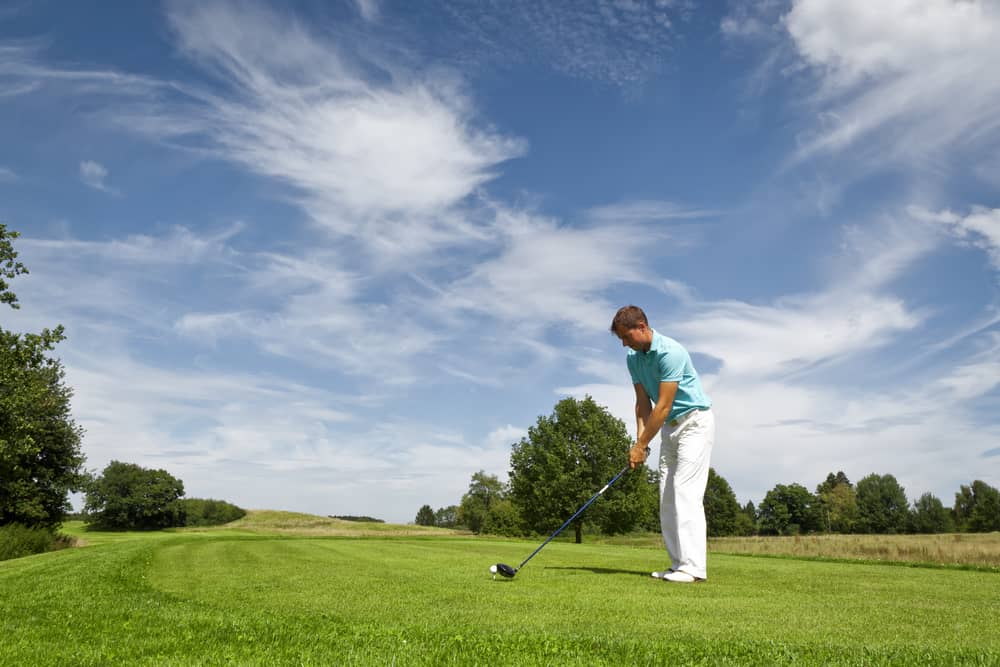 young male golf player