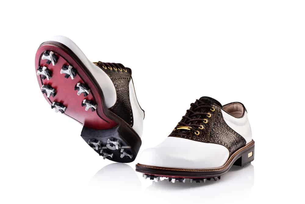 A pair of golf shoes