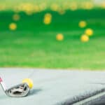 Golf player using golf club
