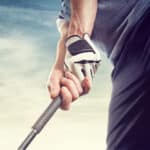 Golfer wearing gloves