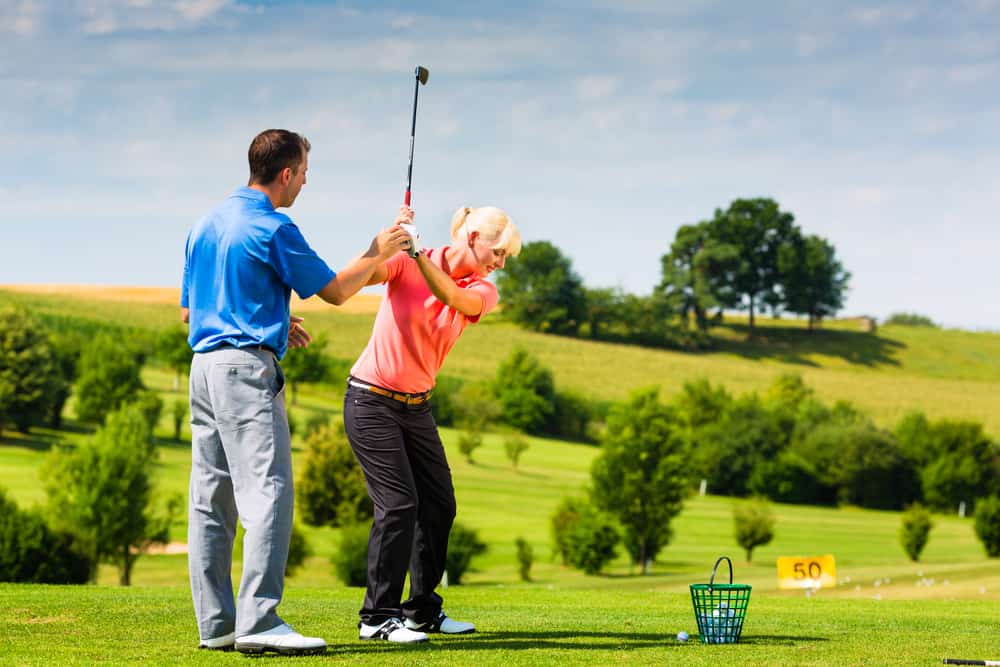 Young female golf player