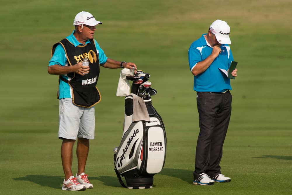 Damien McGraine of Ireland and caddy