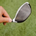 Golf club in hand
