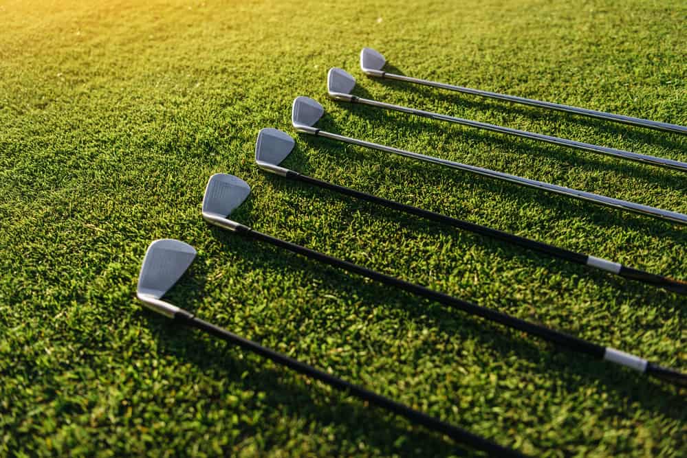 Golf clubs on grass