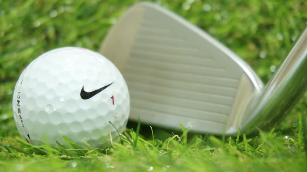 Nike golf ball on green grass