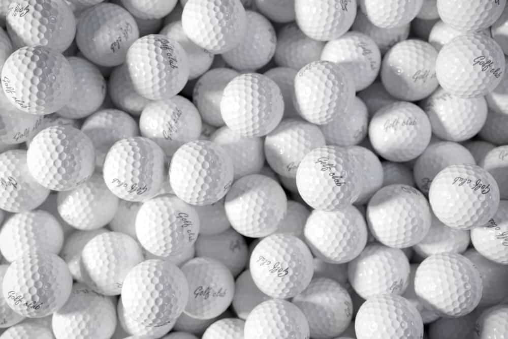 Pile of golf balls. 3d concept.