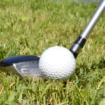 Hybrid golf club on Tee
