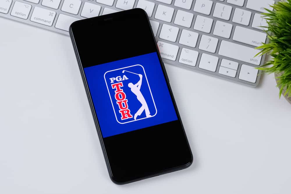 PGA TOUR app logo on a smartphone screen