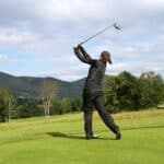 Girl playing golf