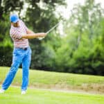 Golfer practicing