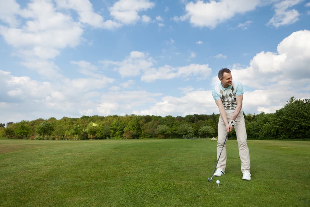 man playing golf